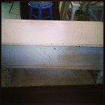 A much painted cedar cabinet dying to be refinished